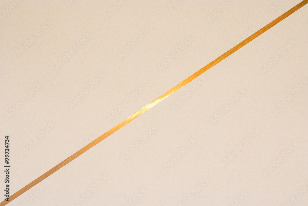 golden line on color paper background - abstract graphic design - obrazy, fototapety, plakaty 