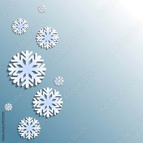 paper snowflakes on blue and white background