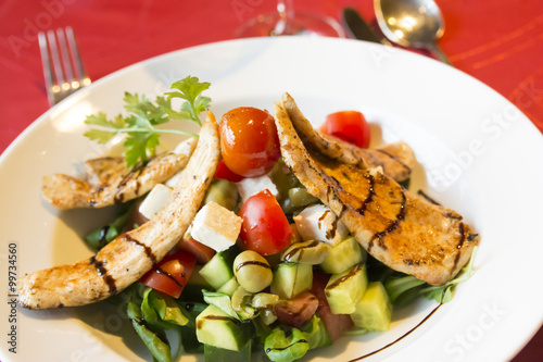 Grilled chicken breast with Greek salad