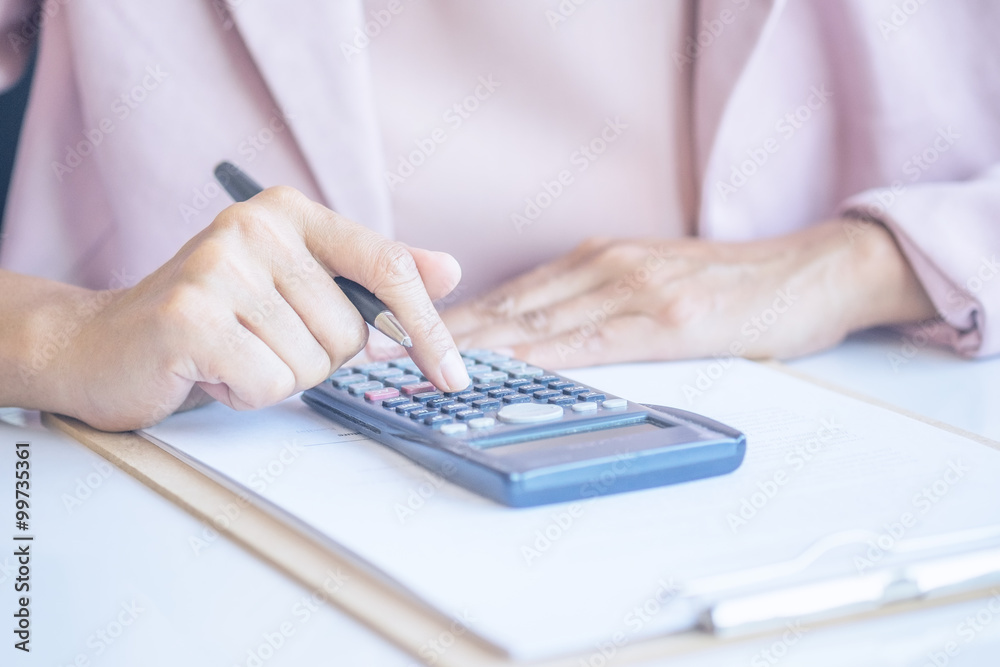 Asia business woman analyzing investment charts on desk.Vintage tone,Retro filter effect,Soft focus,Low light.(selective focus)
Asia business woman analyzing investment charts on desk.Vintage tone,Retro filter effect,Soft focus,Low light.(selective focus)