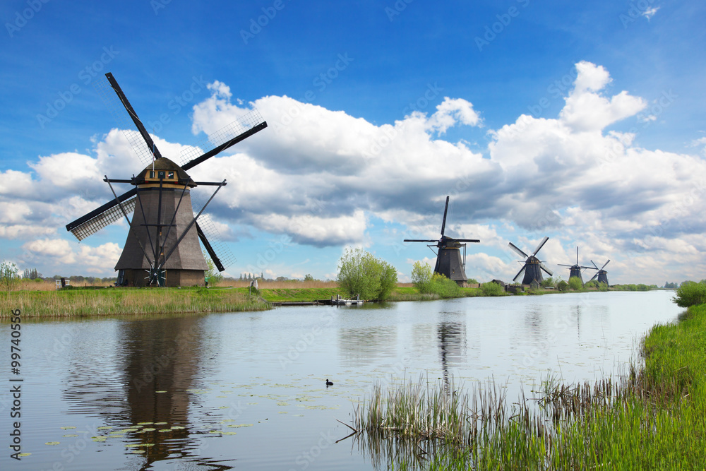 Windmills and water canal in Kinderdijk, Netherlands Windmills and water canal in Kinderdijk, Netherlands