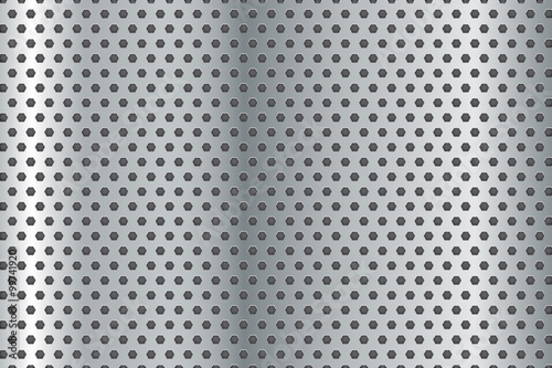 Metal background. Perforated steel texture.