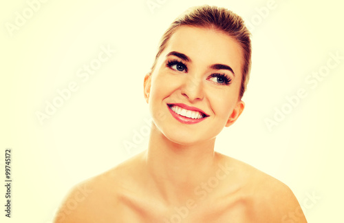 Smiled young naked woman