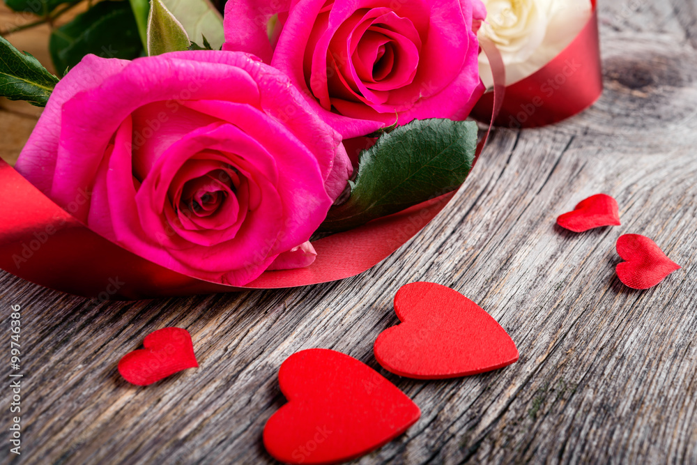 hearts and pink and white roses on wooden table, Valentines Day background hearts and pink and white roses on wooden table, Valentines Day background