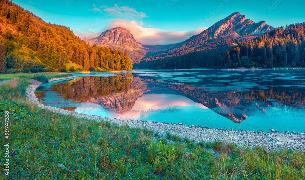 Fototapeta premium Colorful summer sunrise on the incredibly beautiful Swiss lake O