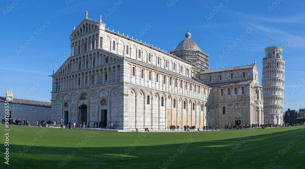 Cathedral and the Pisa Leaning tower in the famous Pisa's Cathedral Square, Square of Miracles (Piazza dei Miracoli)

