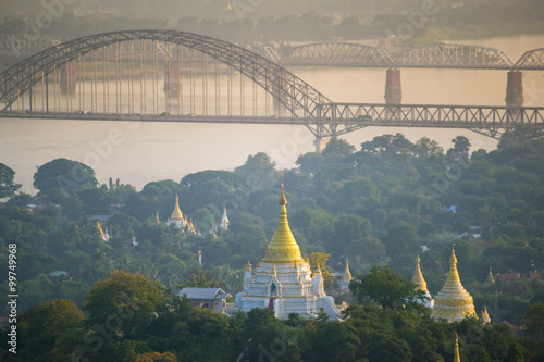 the bridge across Irrawadee river and the old pagodas in Sagaing Area. Mandalay. Myanmar