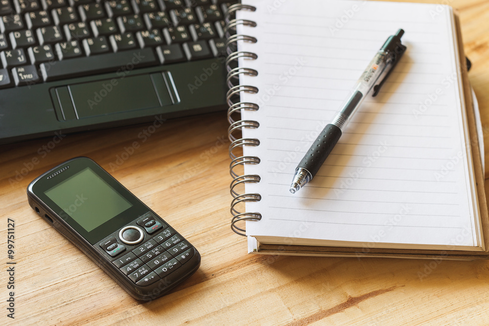 Pen, Blank notepad and laptop on the office. Pen, Blank notepad and laptop on the office.