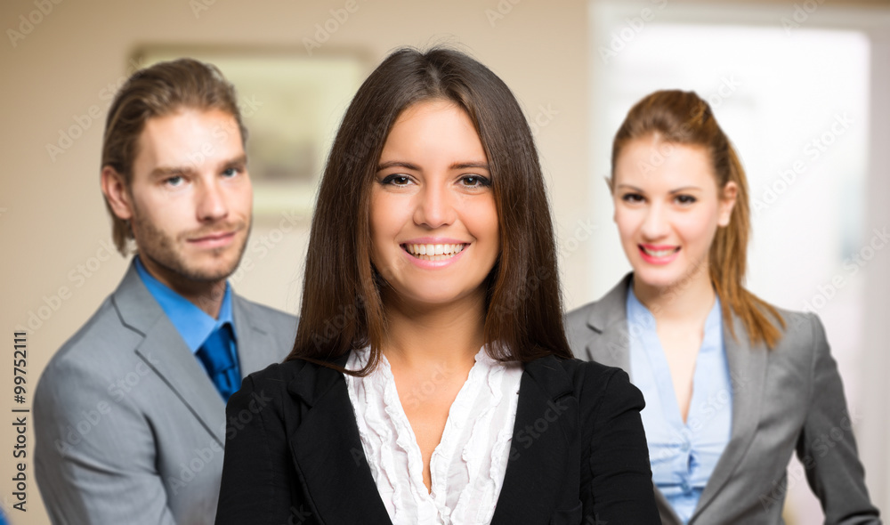 Three businesspeople welcoming you Three businesspeople welcoming you