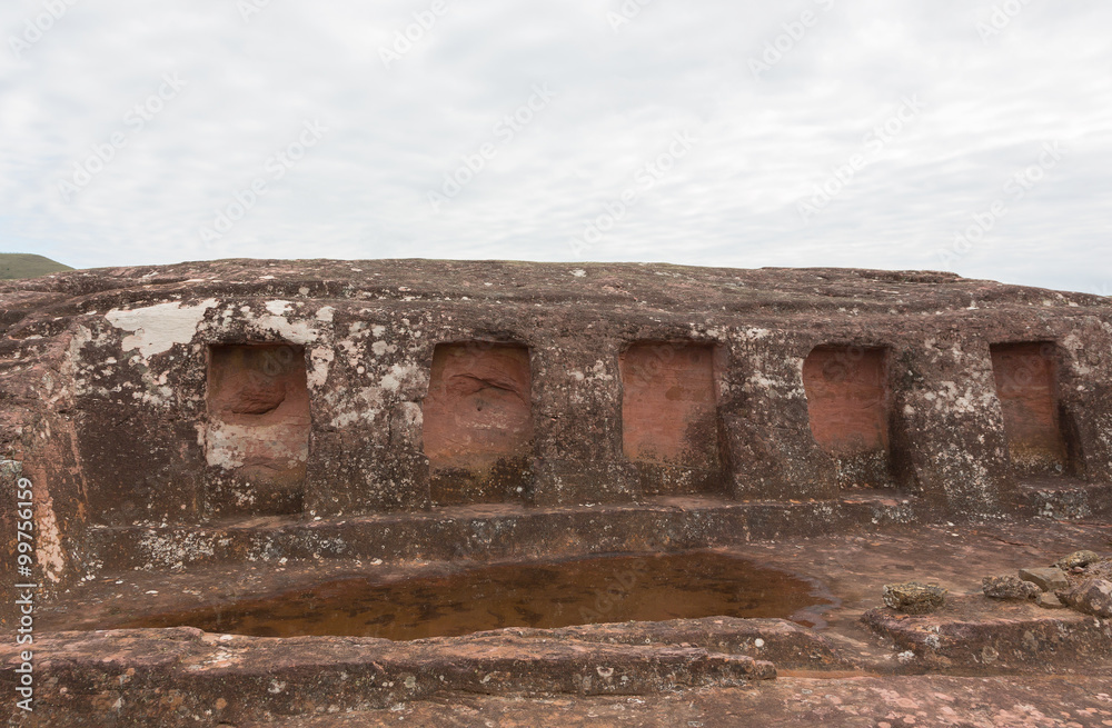 Close-up view of the niches cut in the rock in El Fuerte de Samaipata (Fort Samaipata)