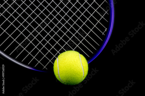 Tennis Racquet and Ball on Black Background © bigal04uk