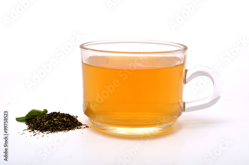 Green Tea cup with pile on white background