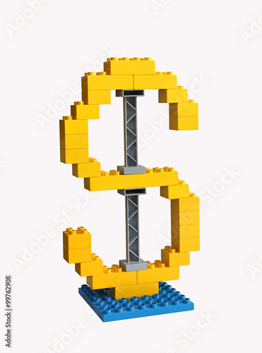 Photos Dollar sign made from children's blocks. Economic growth and sta