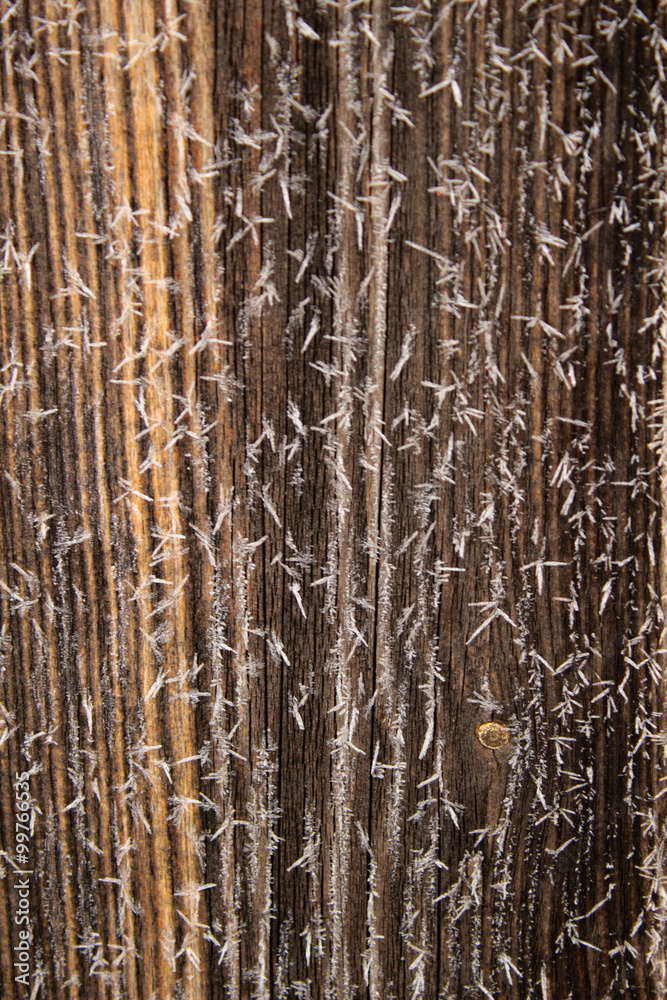 Obraz premium Old wood texture with snow flakes