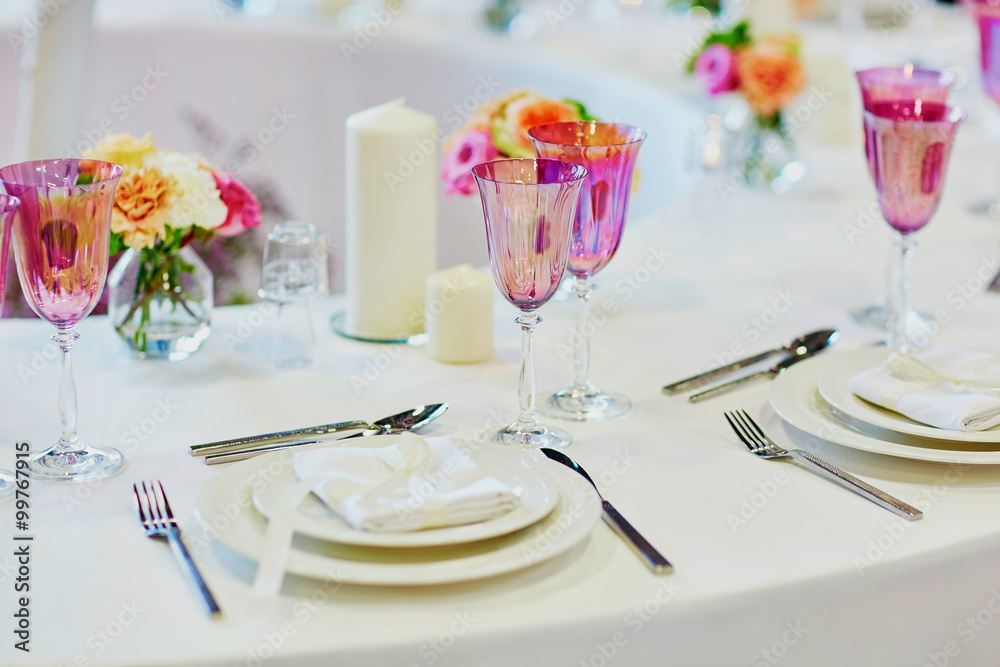 Table set for an event party or wedding reception Table set for an event party or wedding reception