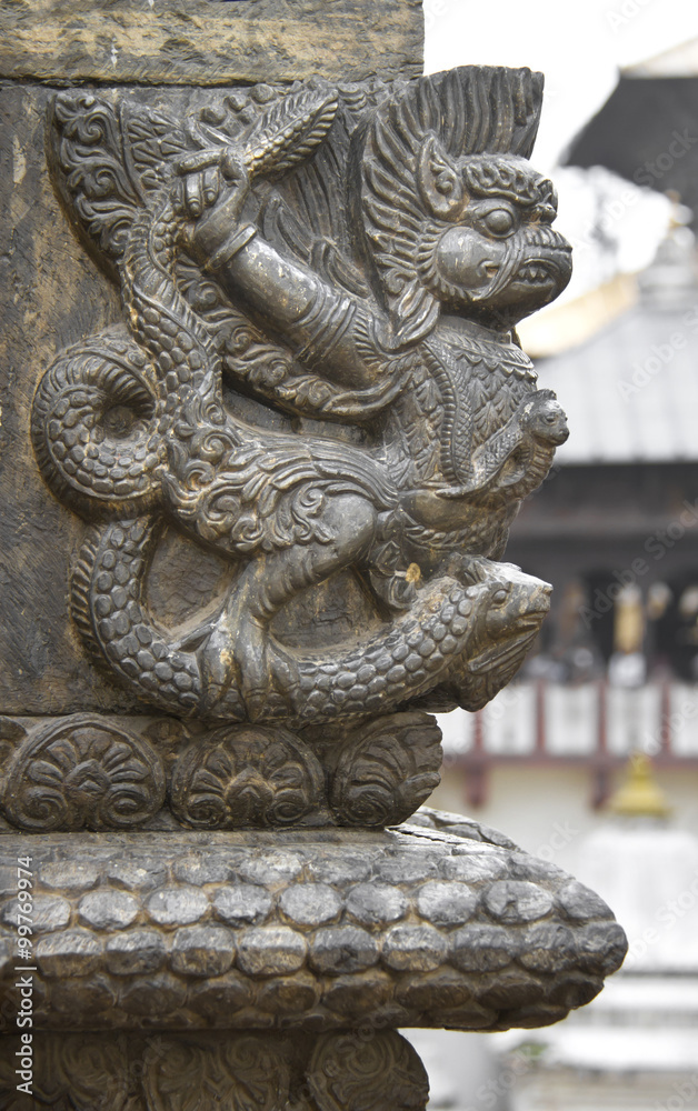 Bas-relief of winged demon in Pashupatinath temple, Khatmandu, N Bas-relief of winged demon in Pashupatinath temple, Khatmandu, N