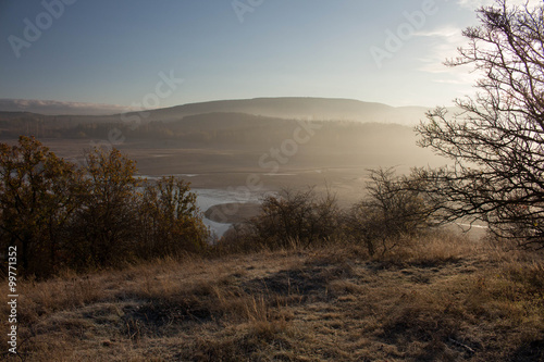 View of the lake and mountains in the early morning.