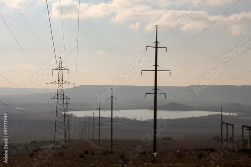 Early morning power lines, power poles.