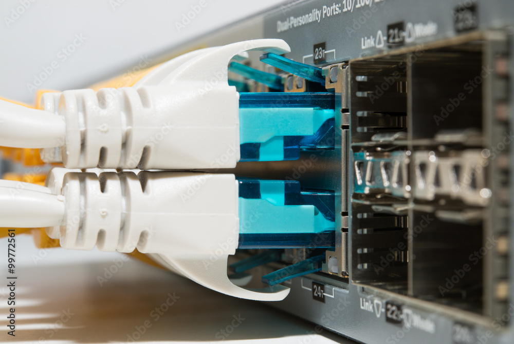 Patching cords connected to router close up Patching cords connected to router close up