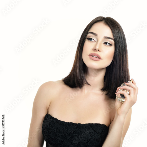 Portrait of gorgeous lady with perfume  young beautiful woman ho