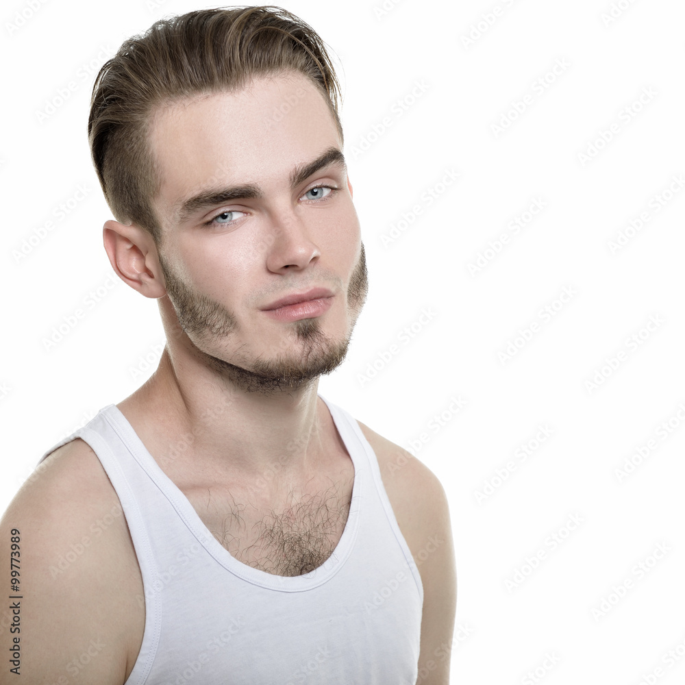 Obraz premium Portrait of young man over white background, image toned.