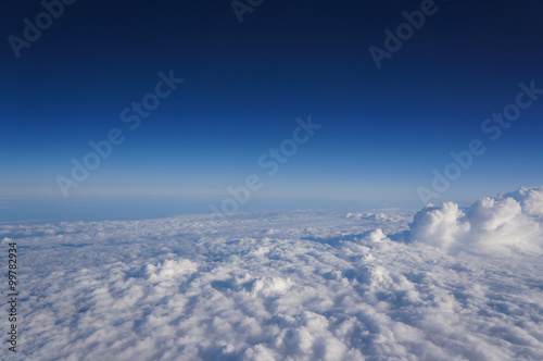 View on the blue sky from the airplane © juliachikulaeva
