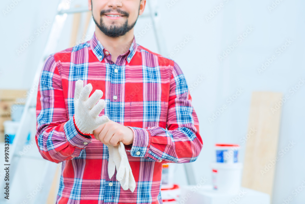 Fototapeta premium Handsome man doing renovation 