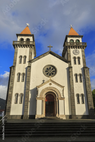 Church of Nossa Senhora da Alegria in Furnas with cloudy blue sk