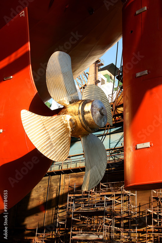 View of the  adjustment screw of the ship standing  on the dock in the Gdansk  Ship Repair Yard