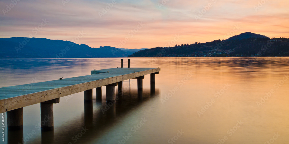 sunset on scenic mountain lake 