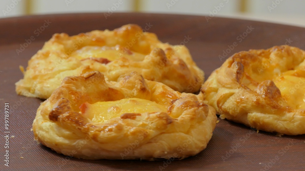 appetizing roast pies on a rotating plate, closeup appetizing roast pies on a rotating plate, closeup