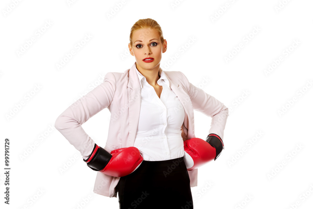 Business woman in red boxing gloves Business woman in red boxing gloves