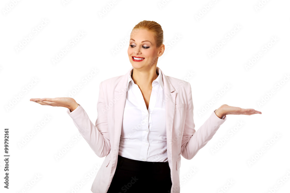 Business woman presenting something on open palm