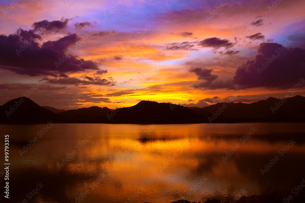 stunning sunset above quiet lake