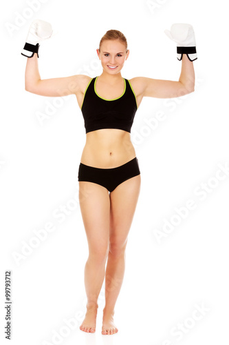 Boxing fitness woman wearing white boxing gloves