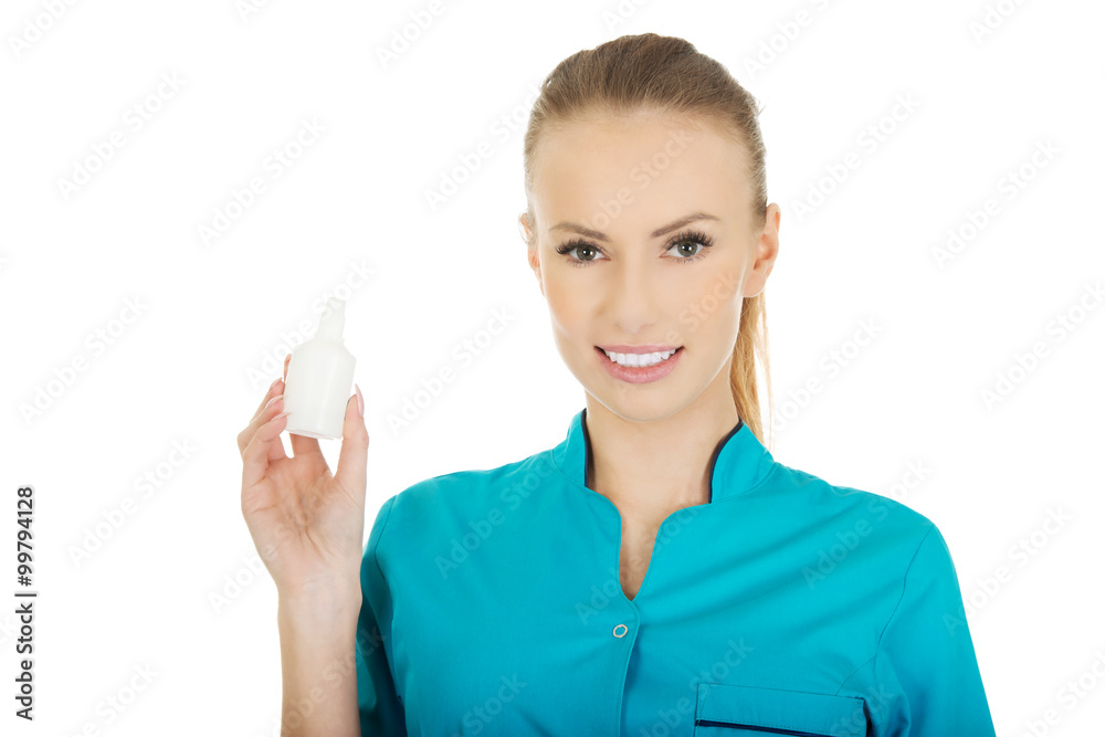 Nurse in uniform with hydrogen peroxide. Nurse in uniform with hydrogen peroxide.