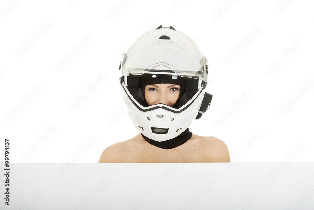 Woman in motorcycle helmet.