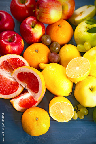 Fruits on dark blue wooden background