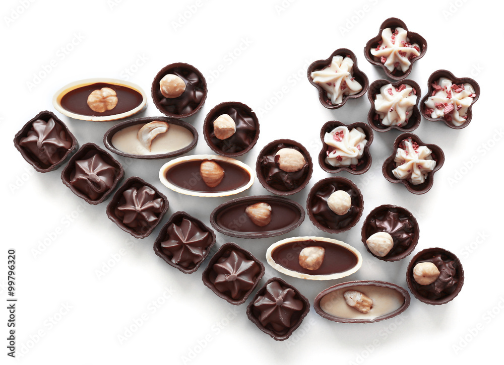 Composition of chocolate candies on white background Composition of chocolate candies on white background