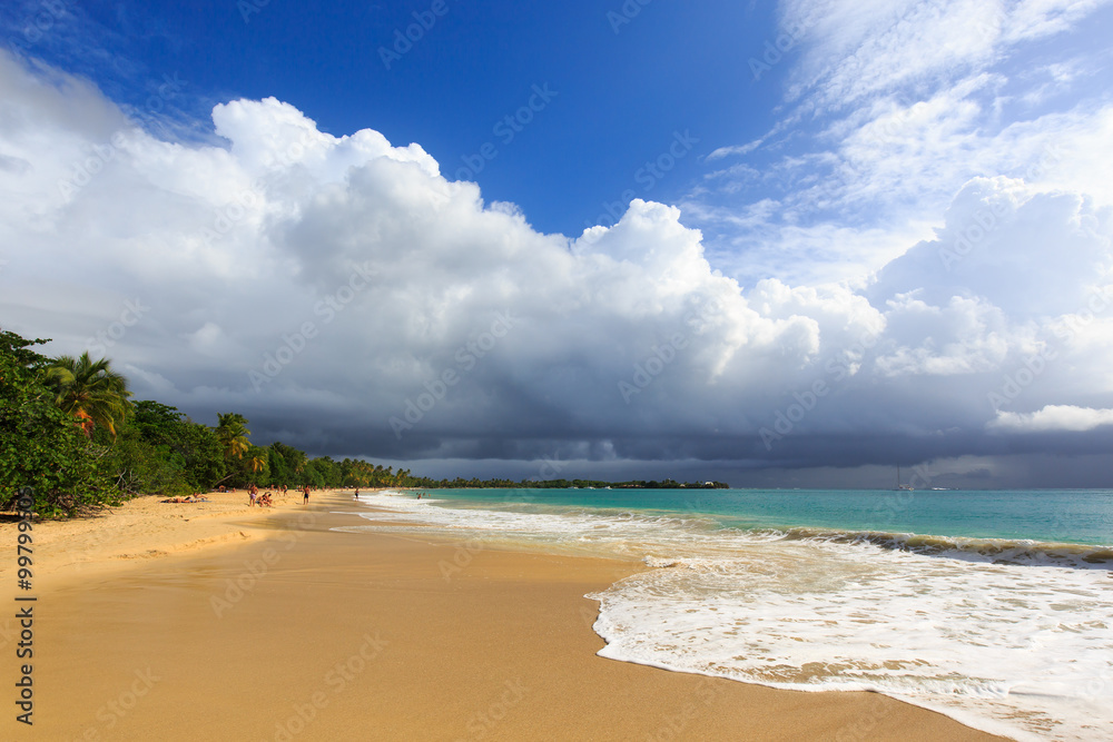 Before the thunderstorm on an exotic beach in caribbean. Les Salines Beach