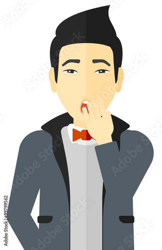 Apathetic young man yawning.