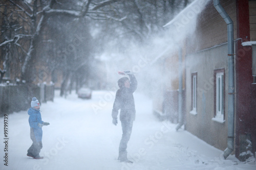 People on the street in snowstorm © Anna Jurkovska