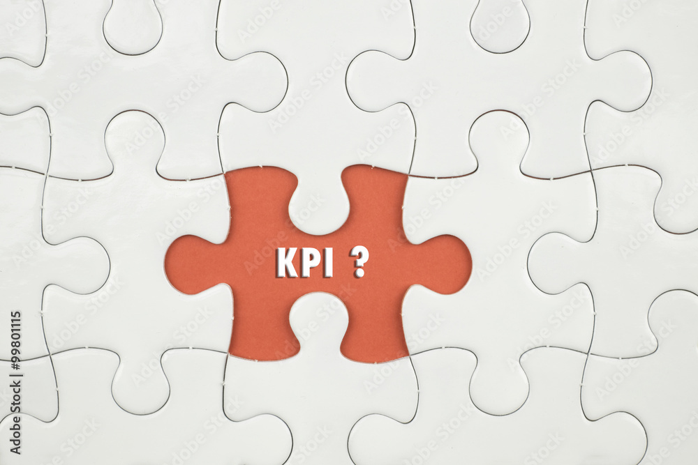 Jigsaw puzzle on color paper background with a word KPI ? Jigsaw puzzle on color paper background with a word KPI ?