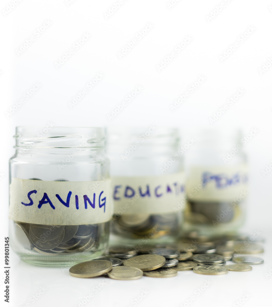 Money jar with coins. Saving Concept. over white background Money jar with coins. Saving Concept. over white background