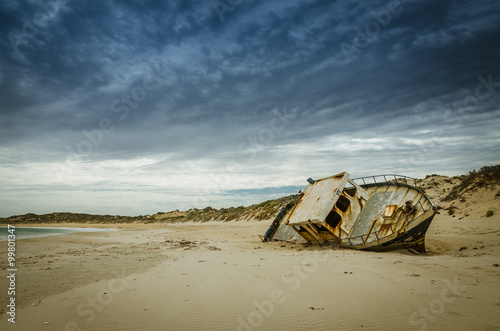 Fishing boat wrecking on the beach