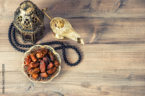Ramadan lamp, rosary and dates. Holidays decoration