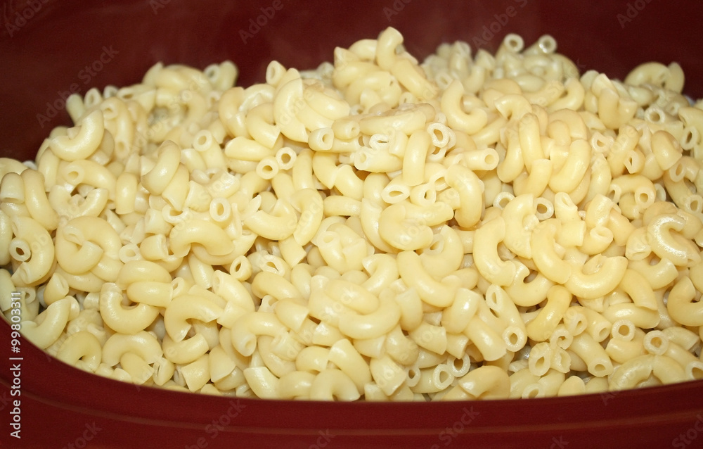 Casserole dish filled with cooked pasta noodles
Casserole dish filled with cooked pasta noodles
