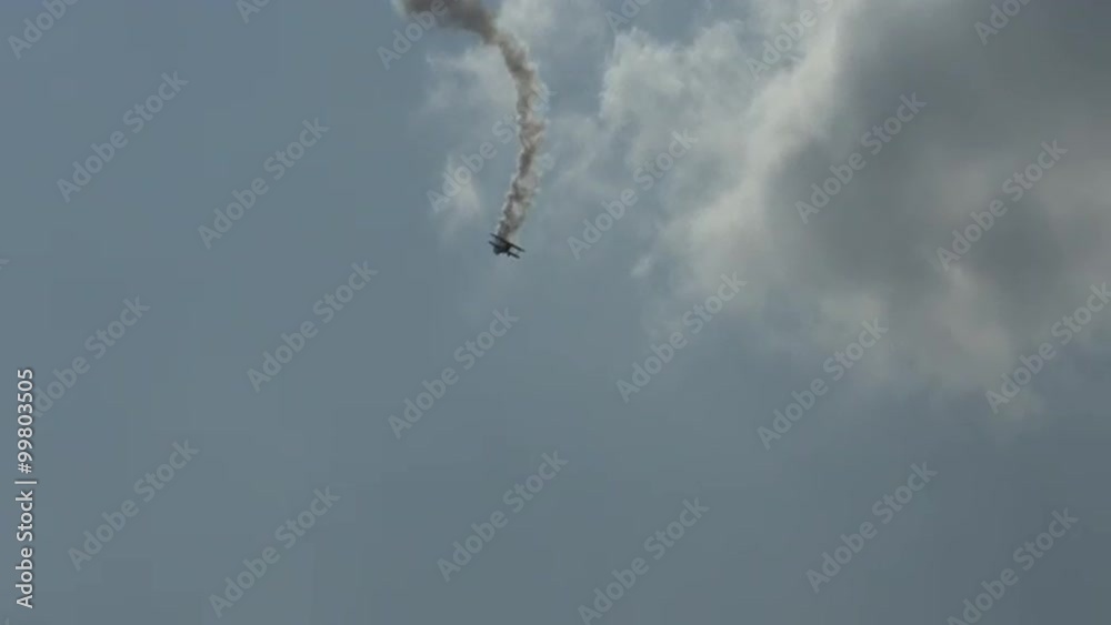 Jet Waco, a jet-powered biplane, performs aerobatics, spinning ...