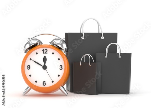 alarm clock and shopping bag (time to buy concept)