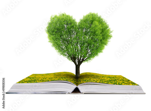 Book with a tree in the shape of heart isolated on white background